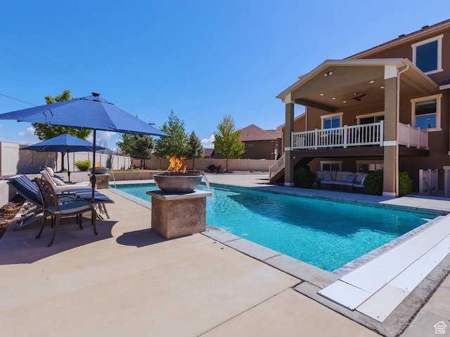 view of pool with a fenced backyard, a fenced in pool, a patio, and stairway