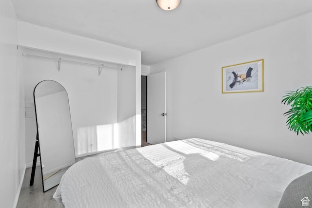 1167 W 4300 S Unit 27C, Taylorsville, UT 84123 - bedroom with baseboards and wood finished floors