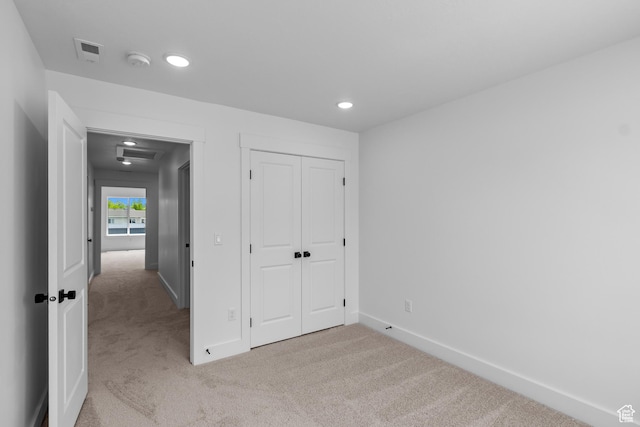 688 N 600 W Unit 104, Tremonton, UT 84337 - unfurnished bedroom with carpet, recessed lighting, and a closet
