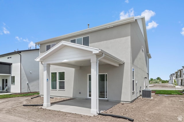 688 N 600 W Unit 104, Tremonton, UT 84337 - rear view of house featuring a patio area and stucco siding