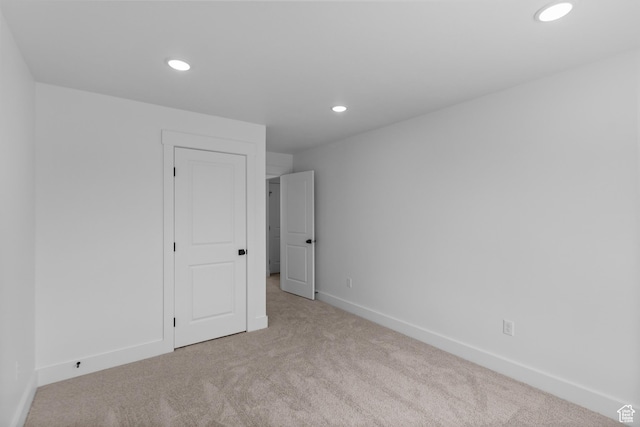 688 N 600 W Unit 104, Tremonton, UT 84337 - spare room featuring carpet flooring and recessed lighting