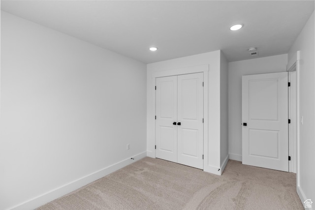 688 N 600 W Unit 104, Tremonton, UT 84337 - unfurnished bedroom featuring carpet flooring, recessed lighting, and a closet
