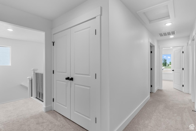 688 N 600 W Unit 104, Tremonton, UT 84337 - hallway with light colored carpet, an upstairs landing, and recessed lighting