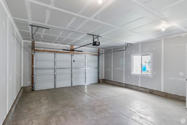 688 N 600 W Unit 104, Tremonton, UT 84337 - garage featuring a garage door opener