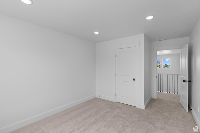 688 N 600 W Unit 104, Tremonton, UT 84337 - unfurnished bedroom with recessed lighting and light colored carpet