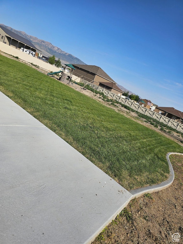 428 S Saddle Rd, Grantsville, UT 84029 - view of grassy yard with a mountain view