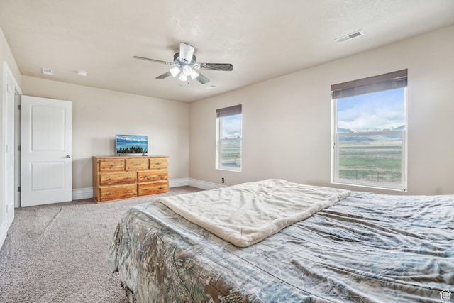 3214 W Ridgeline Rd, Stockton, UT 84071 - bedroom featuring baseboards, visible vents, ceiling fan, and carpet