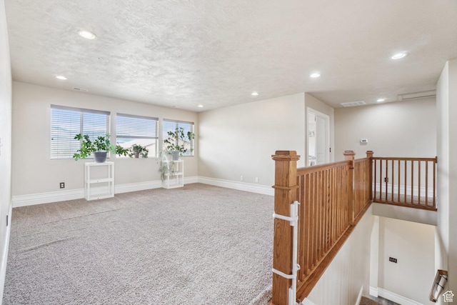 3214 W Ridgeline Rd, Stockton, UT 84071 - interior space with baseboards, carpet flooring, recessed lighting, and visible vents