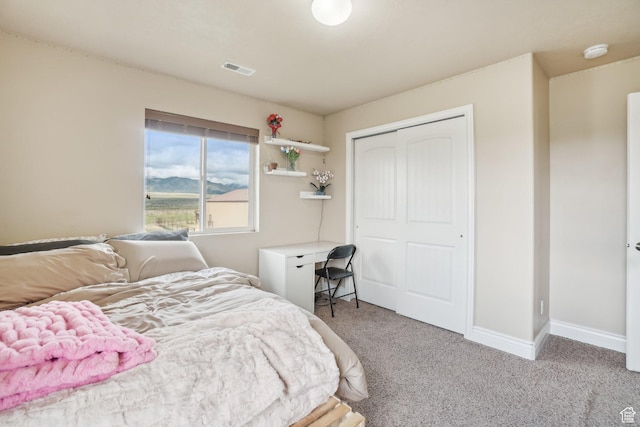 3214 W Ridgeline Rd, Stockton, UT 84071 - carpeted bedroom featuring baseboards, a closet, and visible vents
