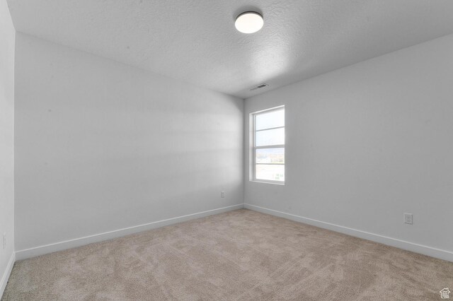 1446 N 3250 W, Provo, UT 84601 - carpeted empty room with baseboards, a textured ceiling, and visible vents