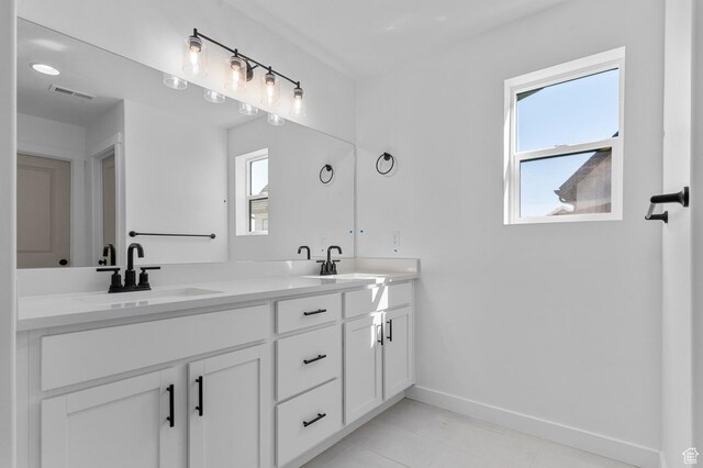 1446 N 3250 W, Provo, UT 84601 - full bath with double vanity, baseboards, visible vents, and a sink