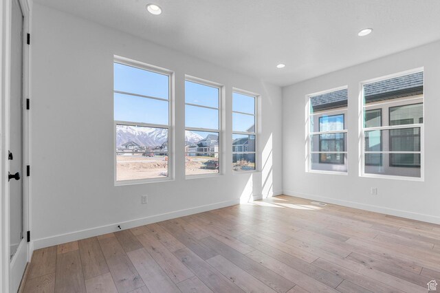 1446 N 3250 W, Provo, UT 84601 - spare room featuring recessed lighting, baseboards, and light wood-type flooring