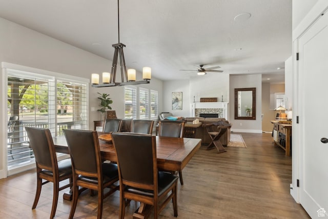 272 S 300 E, Midway, UT 84049 - dining space featuring a tile fireplace, a ceiling fan, wood finished floors, and baseboards