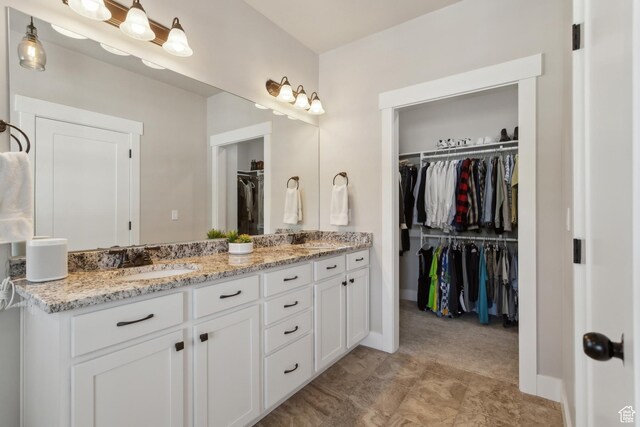 272 S 300 E, Midway, UT 84049 - full bath featuring double vanity, a walk in closet, and baseboards