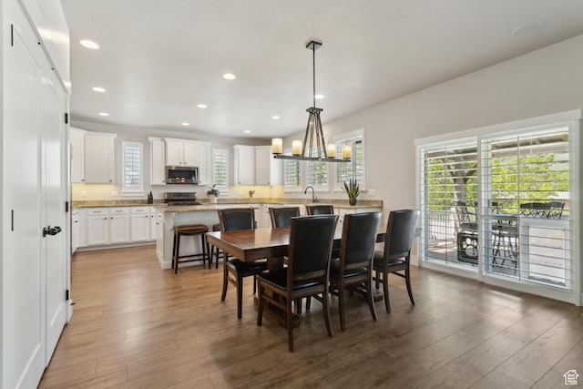 272 S 300 E, Midway, UT 84049 - dining area with wood finished floors, recessed lighting, healthy amount of natural light, and a chandelier