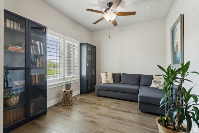 272 S 300 E, Midway, UT 84049 - living area featuring wood finished floors, ceiling fan, and baseboards