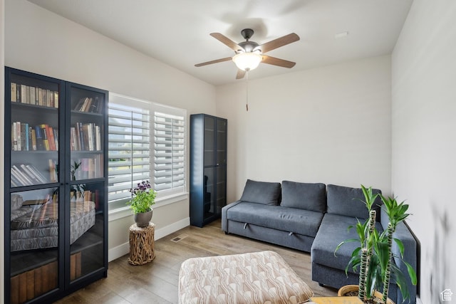 272 S 300 E, Midway, UT 84049 - living room featuring baseboards, a ceiling fan, and wood finished floors