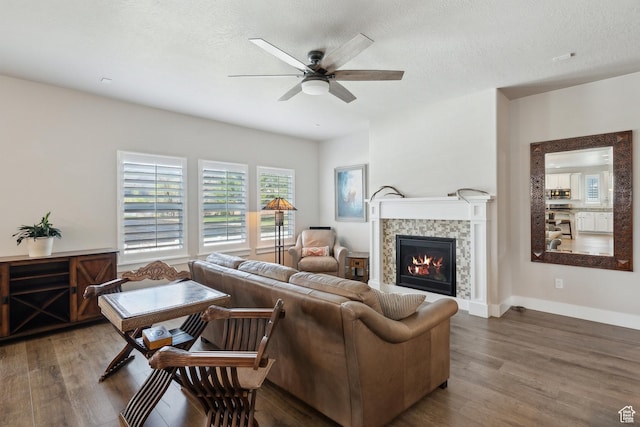 272 S 300 E, Midway, UT 84049 - living area featuring a ceiling fan, a textured ceiling, wood finished floors, and a tile fireplace