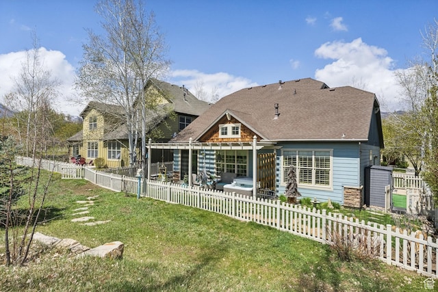 480 E Mission Dr, Midway, UT 84049 - back of property with a fenced backyard, a lawn, and roof with shingles