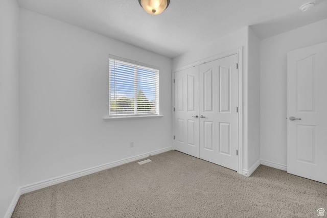 2948 W 150 N, Layton, UT 84041 - unfurnished bedroom with carpet floors, baseboards, and a closet