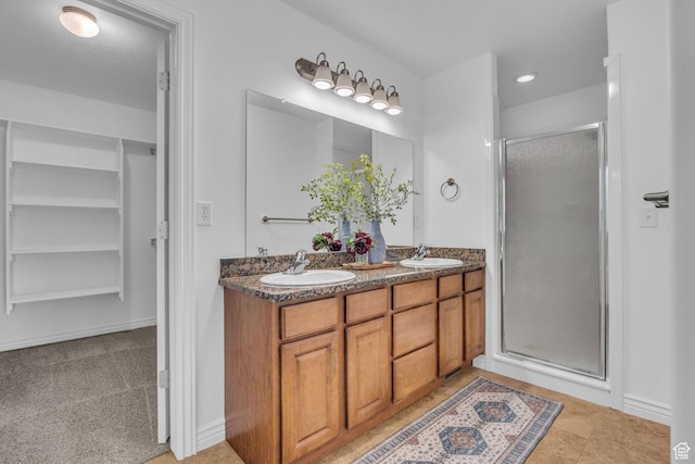 2948 W 150 N, Layton, UT 84041 - bathroom with a shower stall, double vanity, recessed lighting, and baseboards