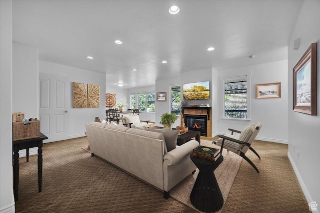 2948 W 150 N, Layton, UT 84041 - carpeted living area featuring recessed lighting, a fireplace, and baseboards
