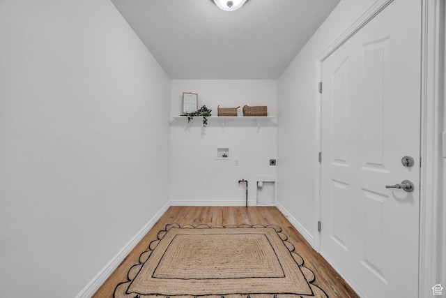 2948 W 150 N, Layton, UT 84041 - laundry room with washer hookup, electric dryer hookup, wood finished floors, and baseboards