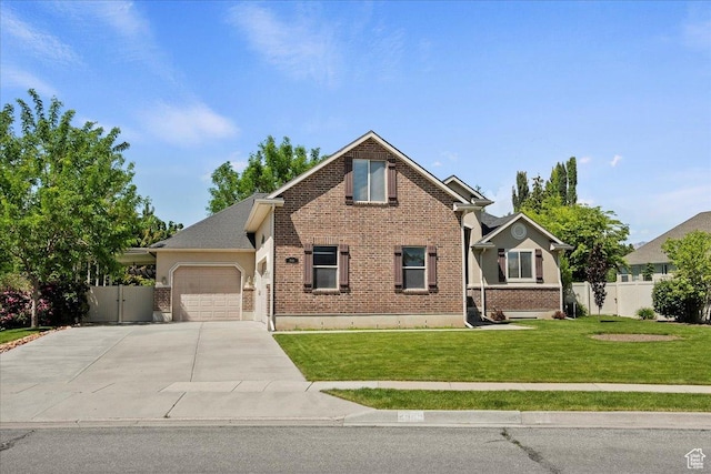 2948 W 150 N, Layton, UT 84041 - view of front of house with brick siding, an attached garage, and driveway