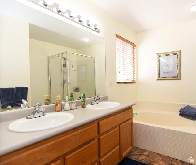 405 E Triple Crown Way E, Grantsville, UT 84029 - bathroom featuring double vanity, a sink, a bath, and a stall shower