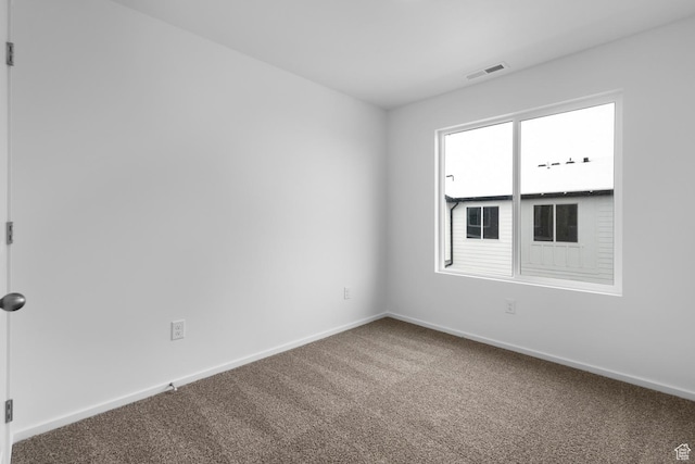 1914 E Thunder Ln N Unit 505, Eagle Mountain, UT 84005 - unfurnished room featuring baseboards, carpet flooring, and visible vents