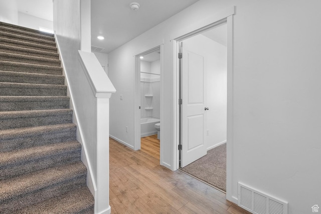 1914 E Thunder Ln N Unit 505, Eagle Mountain, UT 84005 - stairway featuring visible vents, recessed lighting, baseboards, and wood finished floors