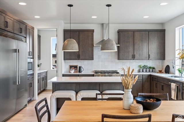 242 W Hillcrest Dr Unit 6, Spanish Fork, UT 84660 - kitchen featuring dark brown cabinetry, appliances with stainless steel finishes, and a sink