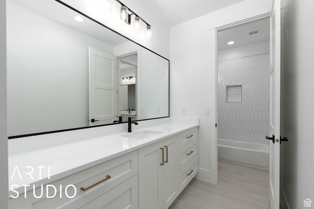 5220 W 2040 S, Hurricane, UT 84737 - full bathroom with vanity, recessed lighting,  shower combination, and baseboards