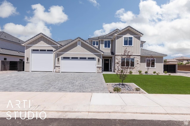 5220 W 2040 S, Hurricane, UT 84737 - craftsman inspired home with a garage, decorative driveway, stone siding, and board and batten siding