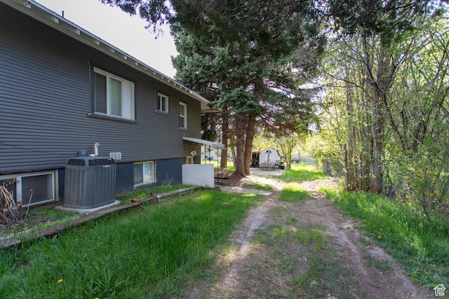 465 S Main St, Providence, UT 84332 - view of yard with central AC and fence