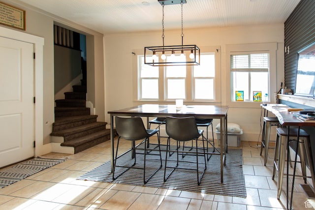 465 S Main St, Providence, UT 84332 - dining room featuring stairs, light tile patterned floors, and a notable chandelier