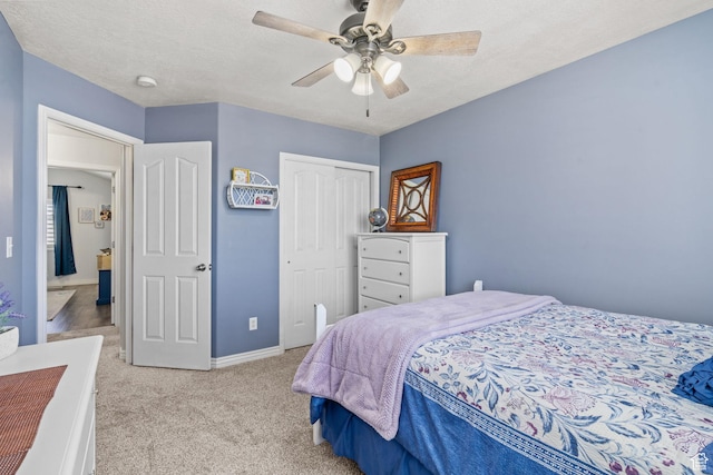 2582 W 1890 N, Clinton, UT 84015 - bedroom with baseboards, light colored carpet, ceiling fan, and a closet
