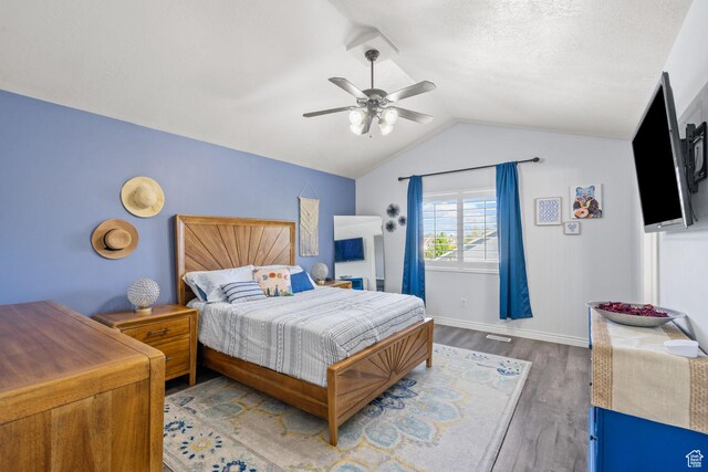 2582 W 1890 N, Clinton, UT 84015 - bedroom with a ceiling fan, baseboards, wood finished floors, and lofted ceiling