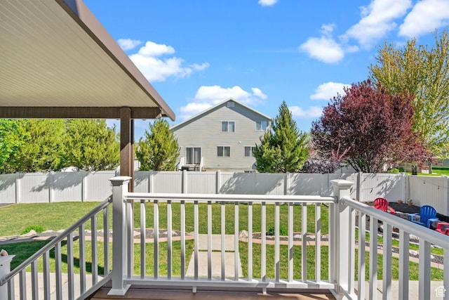 2582 W 1890 N, Clinton, UT 84015 - deck featuring a lawn and a fenced backyard