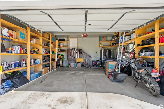 2582 W 1890 N, Clinton, UT 84015 - garage featuring a garage door opener