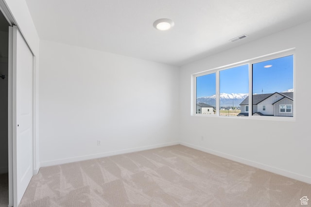 894 S 1100 W, American Fork, UT 84003 - unfurnished bedroom with baseboards, light carpet, a closet, and visible vents