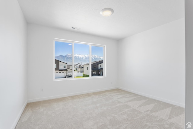 894 S 1100 W, American Fork, UT 84003 - unfurnished room with a mountain view, carpet, baseboards, and visible vents