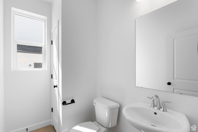 894 S 1100 W, American Fork, UT 84003 - half bathroom with a sink, toilet, and baseboards