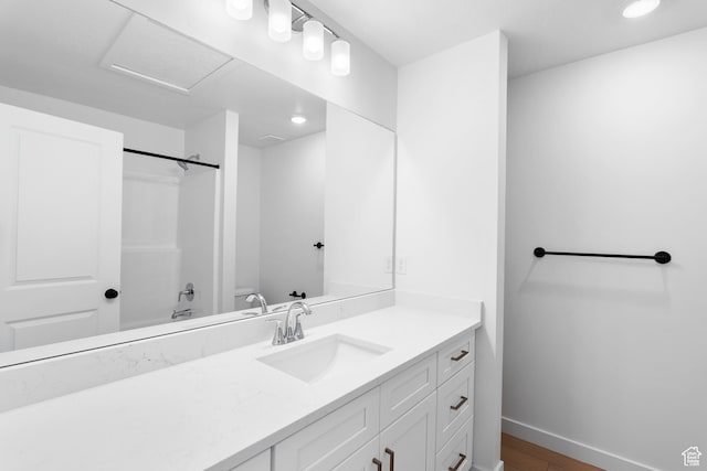 894 S 1100 W, American Fork, UT 84003 - bathroom featuring wood finished floors, vanity, recessed lighting,  shower combination, and baseboards