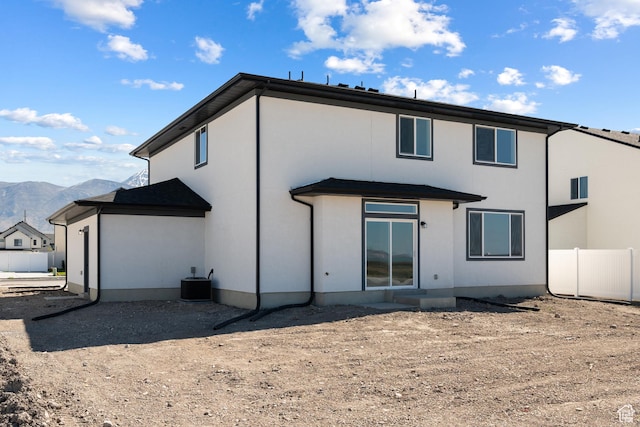 894 S 1100 W, American Fork, UT 84003 - rear view of property with central air condition unit, fence, stucco siding, and a mountain view