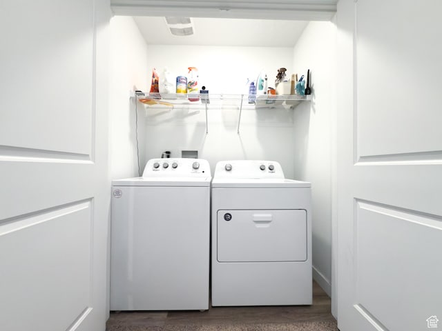 washroom featuring independent washer and dryer and laundry area