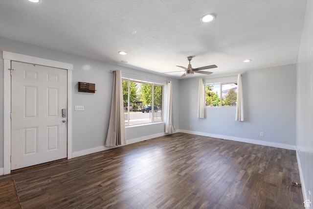 655 W 600 N, Orem, UT 84057 - entryway with dark wood-style floors, a ceiling fan, baseboards, recessed lighting, and a textured ceiling