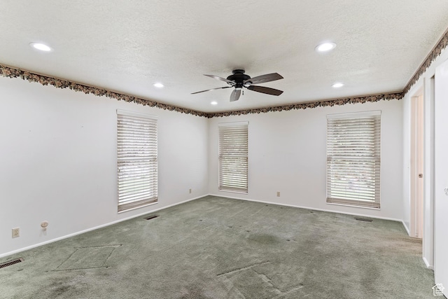 731 W 3750 N, Pleasant View, UT 84414 - empty room with carpet floors, a wealth of natural light, a ceiling fan, and visible vents