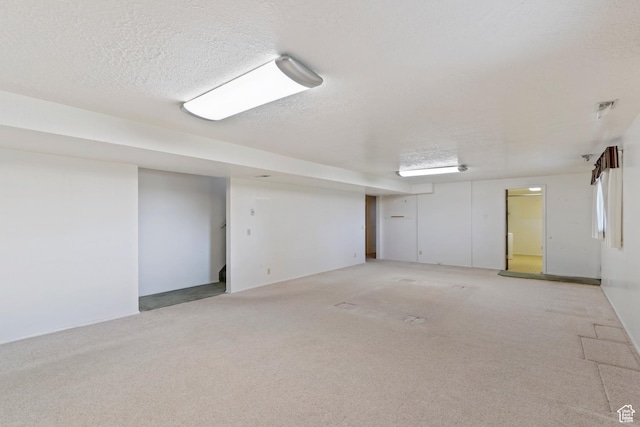 731 W 3750 N, Pleasant View, UT 84414 - finished below grade area with a textured ceiling and light carpet