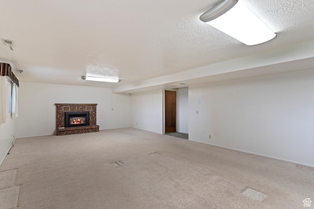 731 W 3750 N, Pleasant View, UT 84414 - finished below grade area with carpet, a brick fireplace, and a textured ceiling